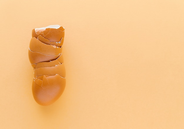 Egg shells on a cream-coloured. Kitchen concept.