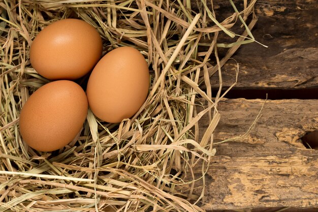 Egg. straw. on wood