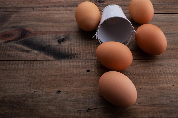 egg on wood background, fresh egg