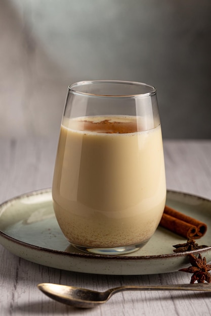 Eggnog cup with cinnamon powder