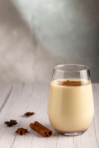 Eggnog cup with cinnamon powder