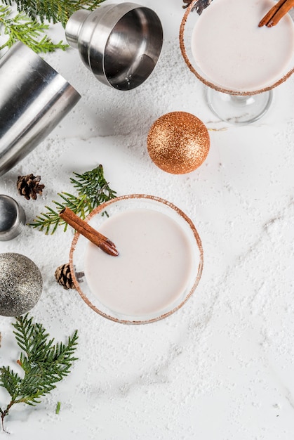 Eggnog martini, with cinnamon sticks