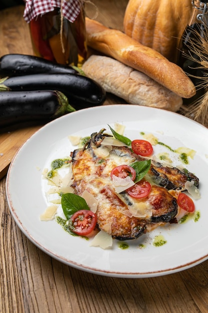 Eggplant dish in a restaurant on a wooden table