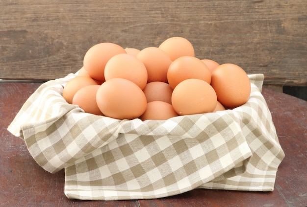 Eggs in basket, close up.