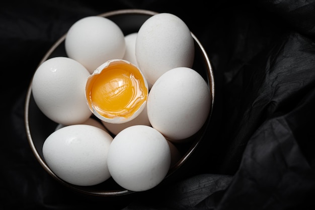 Premium Photo | Eggs on a black background