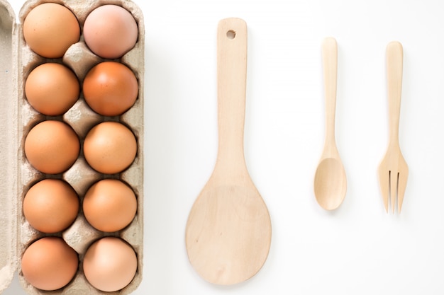 Eggs for cooking on white  top view.