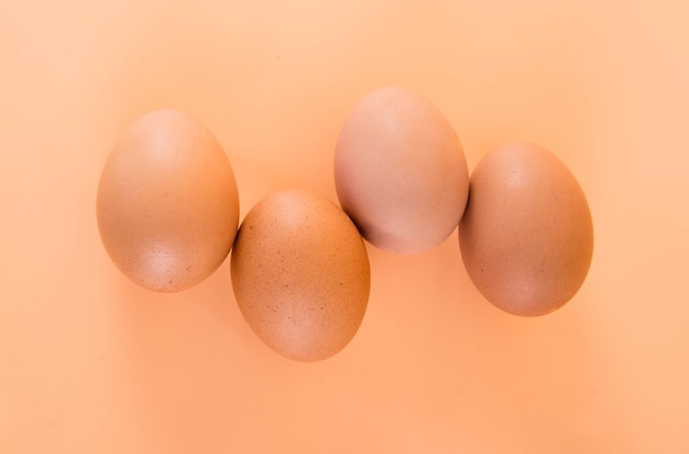 Eggs on cream background