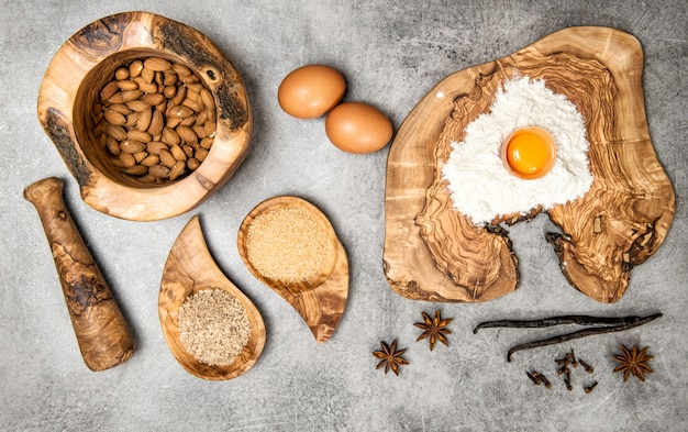 Eggs and flour on a wooden board