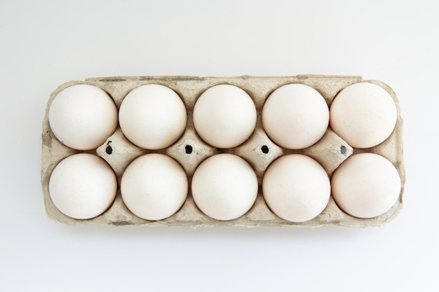 Eggs in a tray on a white background