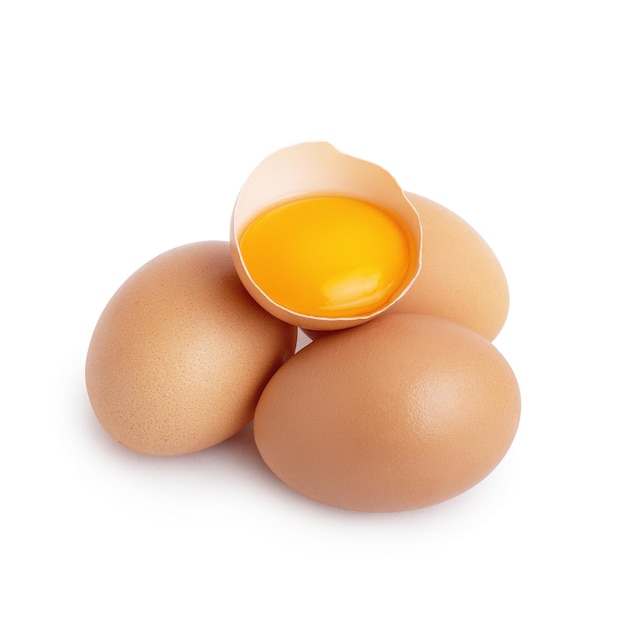 eggs with egg yolk in the shell on a white isolated background