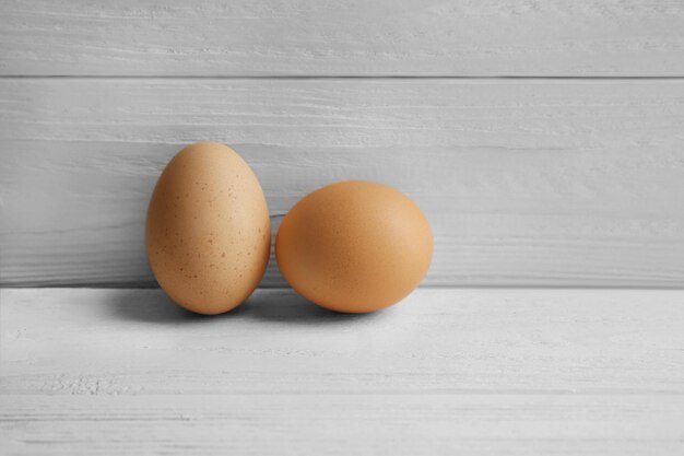 Eggs on wooden background