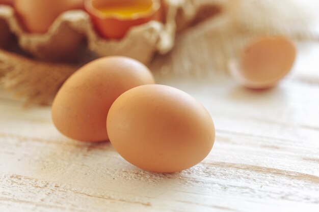 Eggs on wooden background