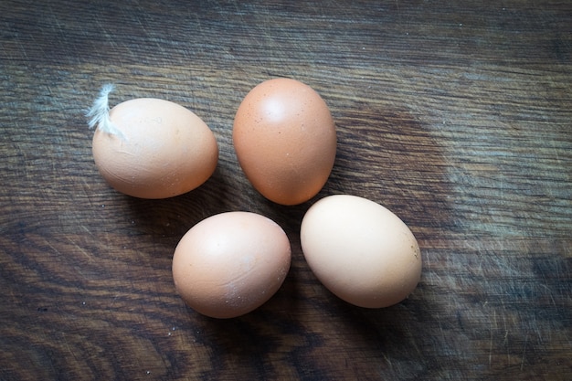 Eggs on wooden table natural food