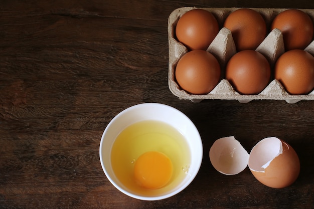 Eggs on the wooden table.                               