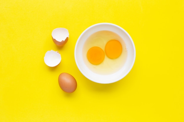 Eggs on yellow background. 