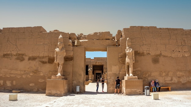 Egypt, Luxor - April 11, 2021: Ancient ruins of the Karnak Temple in Luxor (Thebes), Egypt. The largest temple complex of antiquity in the world. UNESCO World Heritage.