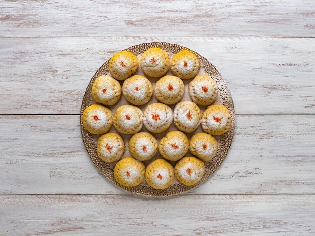 Egyptian cookies "Kahk El Eid", variation with the addition of turmeric when cooking. Cookies of El Fitr Islamic Feast. Ramadan sweets