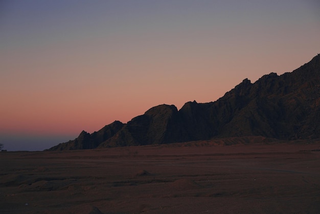 Egyptian dark mountains at sunset