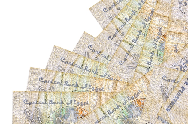 Egyptian piastres bills laying in different order on white surface