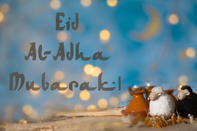 Eid alAdha 희생의 축제 흰색과 검은색 양고기 타진과 밤 푸른 하늘을 배경으로
