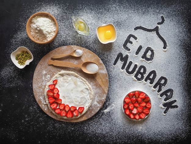 Eid Mubarak - Islamic holiday welcome phrase " happy holiday", greeting reserved. Arabic cuisine wall