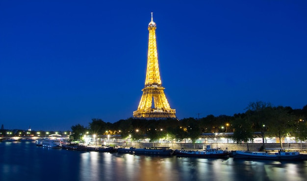 The Eiffel tower at night Paris France