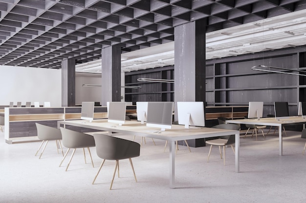 Eigentijds betonnen en houten coworking kantoorinterieur met lege computerschermen apparatuur meubilair en daglicht 3D-rendering