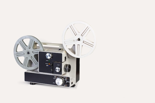 An eight milimeters projector isolated on a white background with copy space