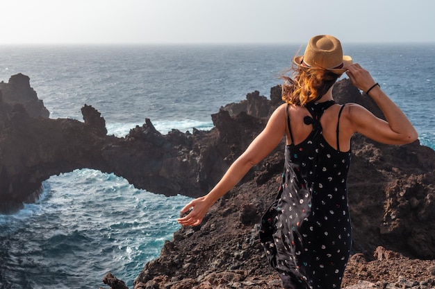 El Hierro Island Canary Islands a young tourist visiting the Arco de la Tosca