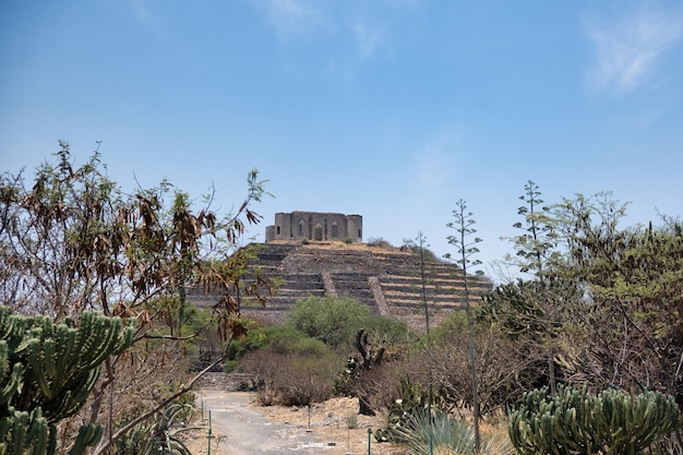 El Pueblito pyramid Quertaro Mexico archaeological zone Mayan ruins Hispanic town blue sky tourist