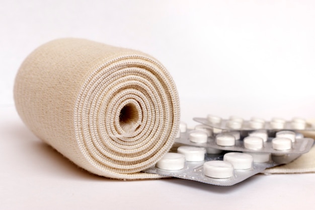 Elastic bandage and pill packaging