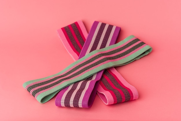 Elastic bands isolated on pink background