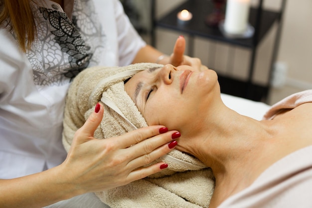 Elderly Caucasian Female On Facial Massage