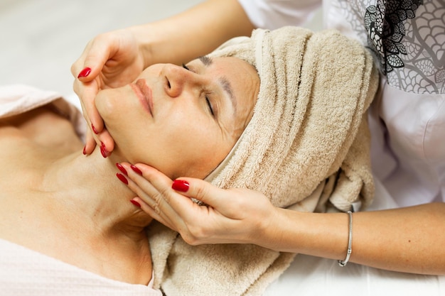 Elderly Caucasian Female On Facial Massage