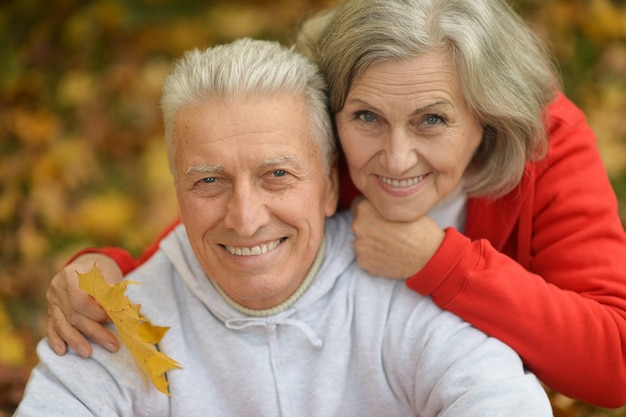 Elderly couple in red and white