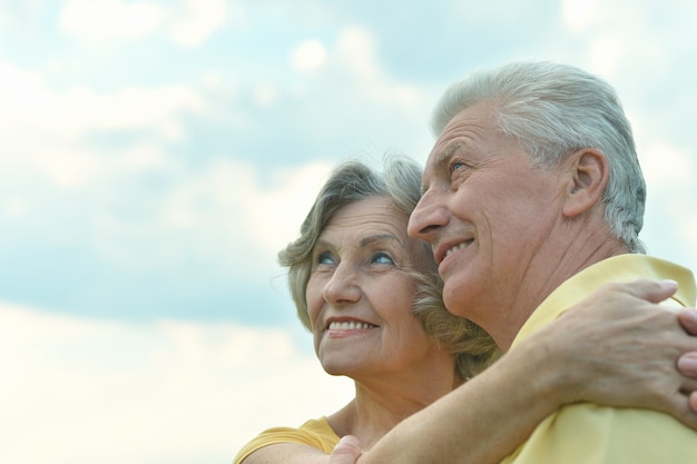 Elderly couple relaxing on a sunny day together