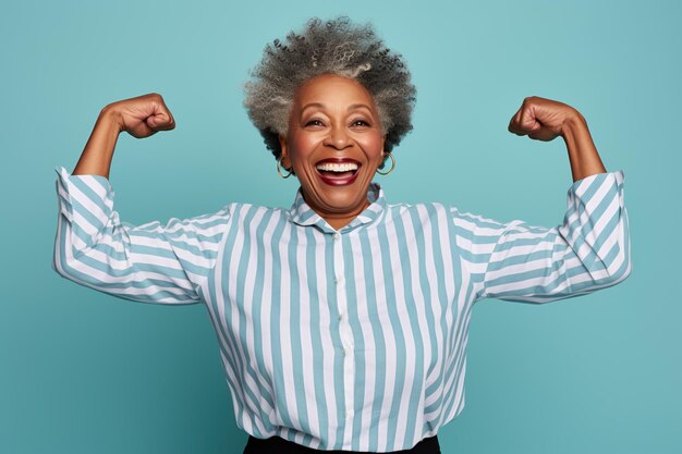 Photo elderly exultant overjoyed jubilant african american woman 50s years old wear light striped shirt