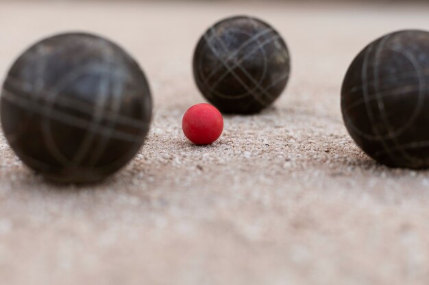 Elderly friends playing petanque