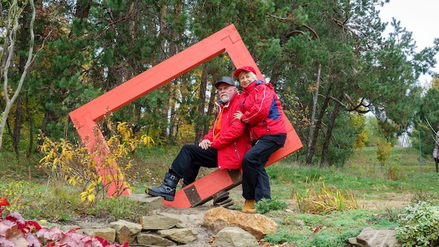 Elderly grayhaired optimistic couple