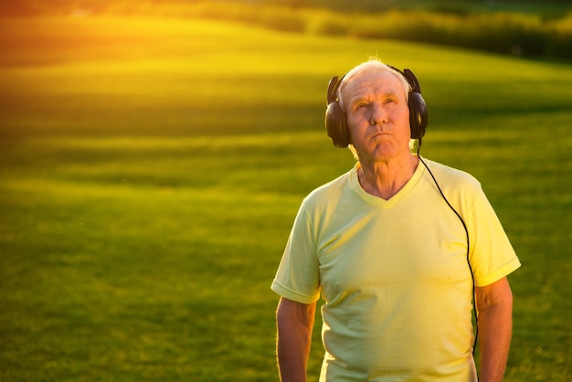 Elderly man in headphones