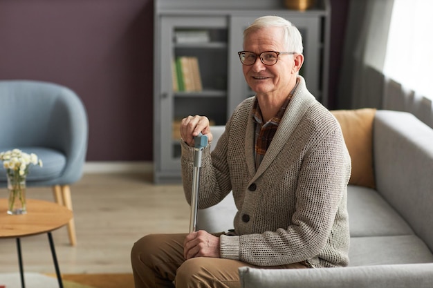 Elderly man resting in the living room