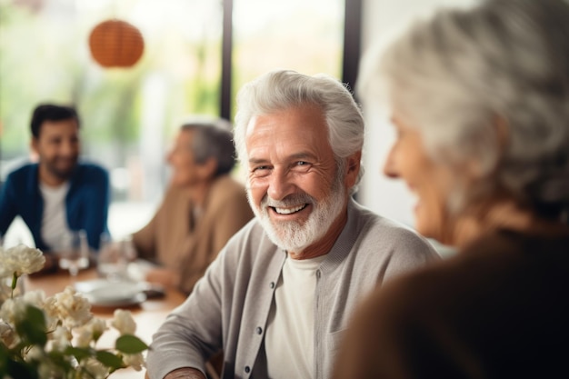 An elderly man smiles at a gathering The concept captures senior enjoyment