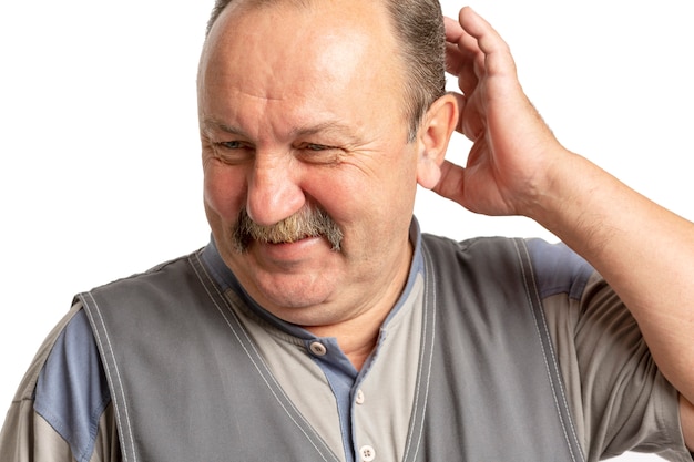 Elderly man with a mustache laughing