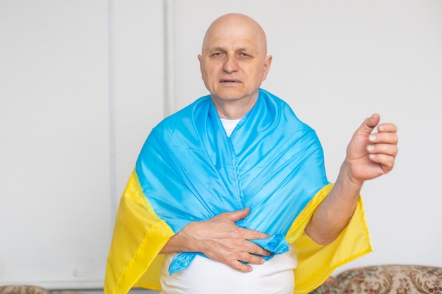 Elderly man with ukraine flag