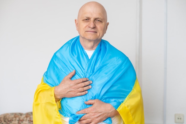 Elderly man with ukraine flag