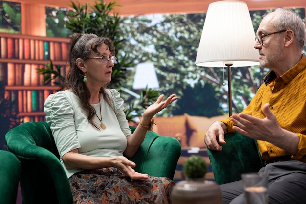 Elderly man and woman enjoying leisure free time at their home