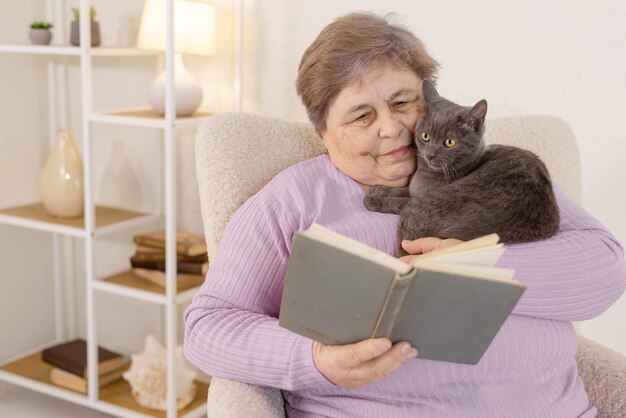 Elderly people take care of cats and enjoy them at home