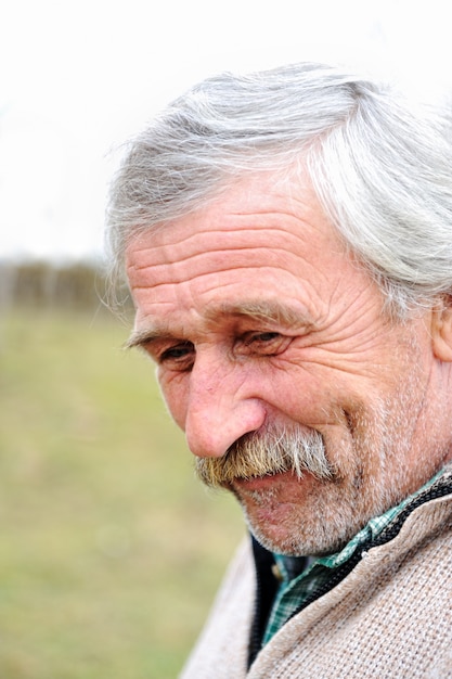 Elderly person, portrait in natural pose