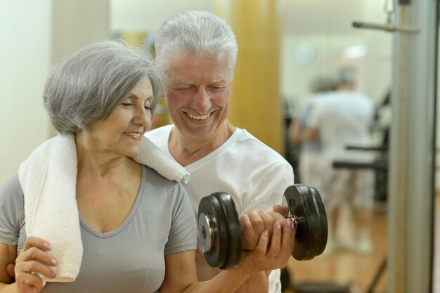 Elderly in sportswear practice sports