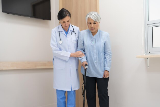 Elderly woman checkup Discuss the symptoms